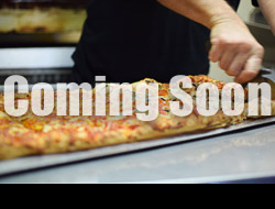 Chef cutting a pizza with a coming soon on the image