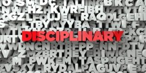 a photo of the word disciplinary in red lettering surrounded by many letters in white lettering