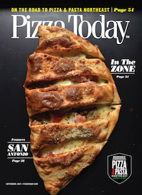 Pizza today magazine with a calzone on the front